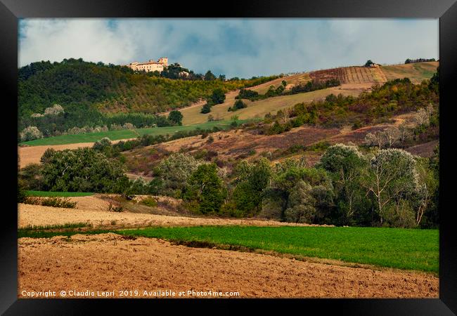 Fields and woods around Montesegale Castle, Italy Framed Print by Claudio Lepri