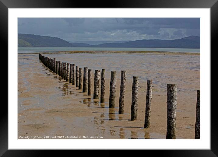 Breakwater posts on Ynylas Nature reserve, looking across Snowdon mountains Framed Mounted Print by Jenny Hibbert