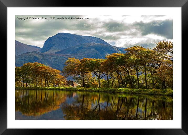 Caledonian Canal with a line of autumnal trees reflecting in the canal Framed Mounted Print by Jenny Hibbert