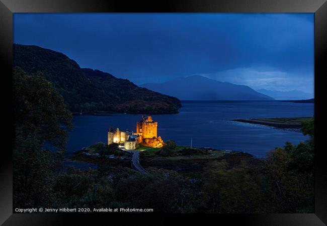 Eilean Donan castle lit up Framed Print by Jenny Hibbert