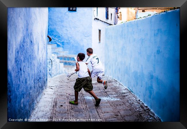 Boys at play Framed Print by Hannan Images