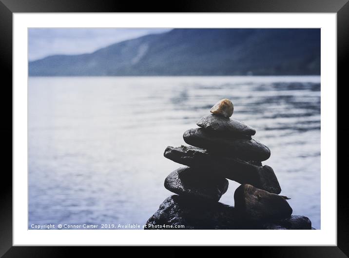 Rock sculpture Framed Mounted Print by Connor Carter