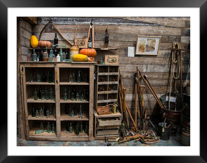 old bottles, garden shed,garden tools Framed Mounted Print by kathy white