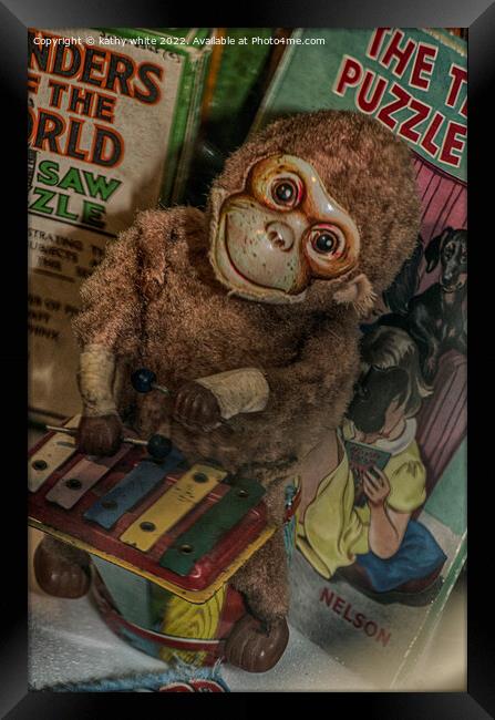 Old toy monkey Framed Print by kathy white
