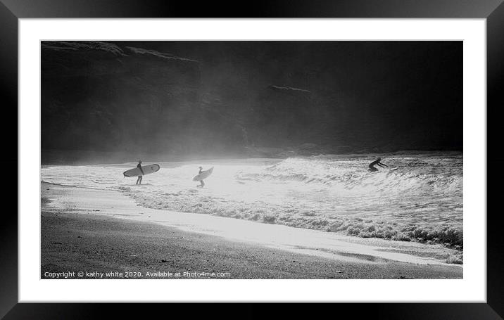  Three surfer, training to be lifeguards, keeping  Framed Mounted Print by kathy white