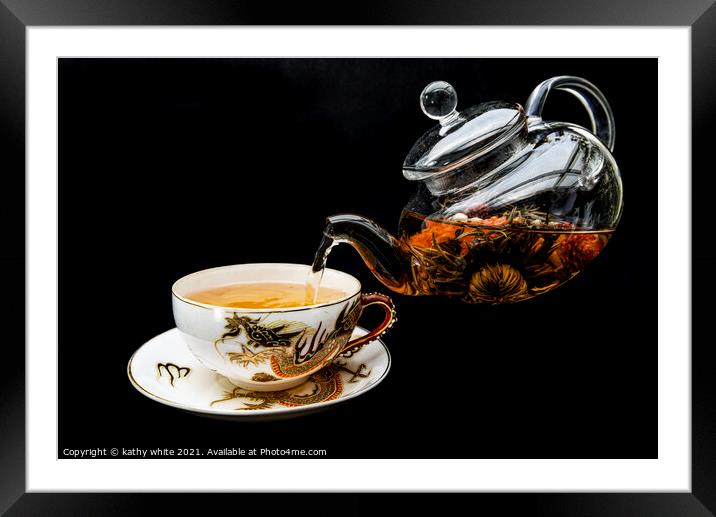 Chinese green tea being poured with glass teapot  Framed Mounted Print by kathy white