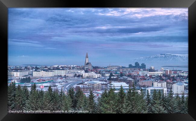 Reykjavik Iceland in the winter with snow Framed Print by kathy white