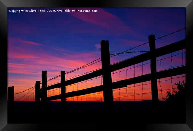 Sunset Fence Framed Print by Clive Rees