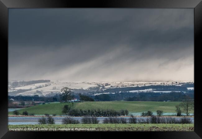 Bright Interval and Snow Squall over Newsham Moor Framed Print by Richard Laidler
