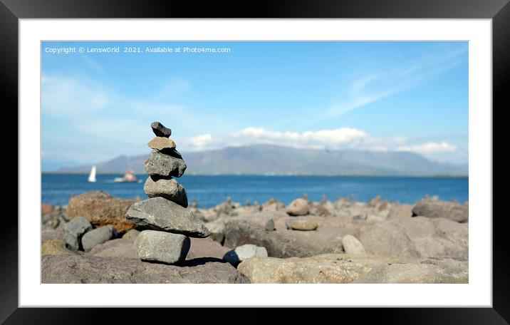 Stacked stones at the coastline of Reykjavik, Iceland Framed Mounted Print by Lensw0rld 