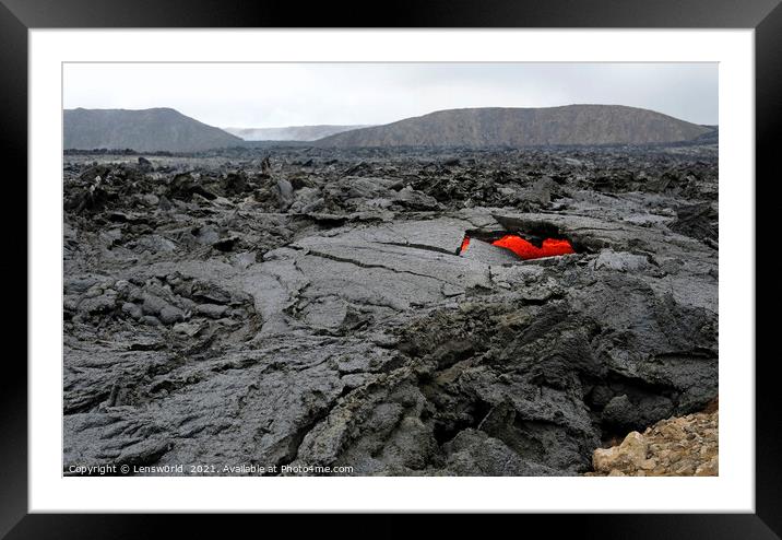 Glimpses of lava in a black lava field in Iceland Framed Mounted Print by Lensw0rld 