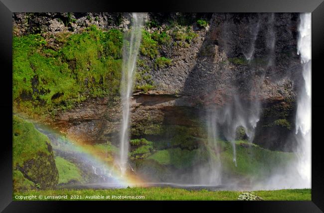Rainbow in front of Seljalandsfoss waterfall in Iceland Framed Print by Lensw0rld 