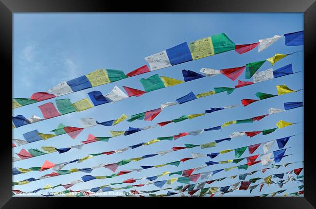 Tibetan prayer flags against the blue sky Framed Print by Lensw0rld 