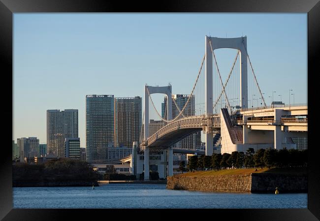 Rainbow Bridge going over Tokyo Bay in Tokyo, Japa Framed Print by Lensw0rld 
