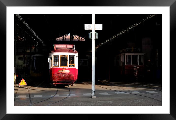 Traditional tram wagon waiting in the shade of the station in Lisbon Framed Mounted Print by Lensw0rld 