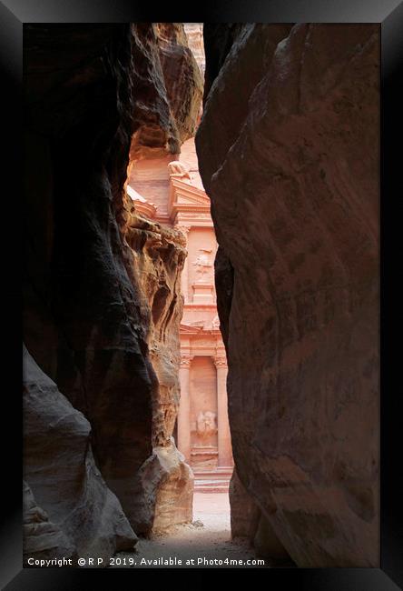Spotting the Treasury through the Siq in Petra Framed Print by Lensw0rld 