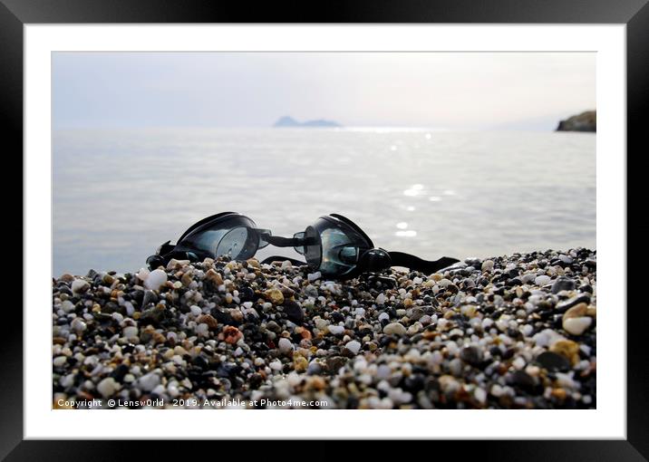 Goggles with the serene scenery of Matala, Crete,  Framed Mounted Print by Lensw0rld 