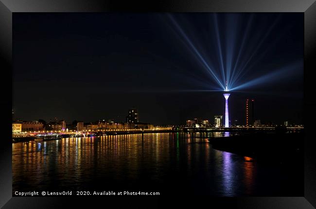 Light show from Düsseldorf's "Rheinturm" at night Framed Print by Lensw0rld 