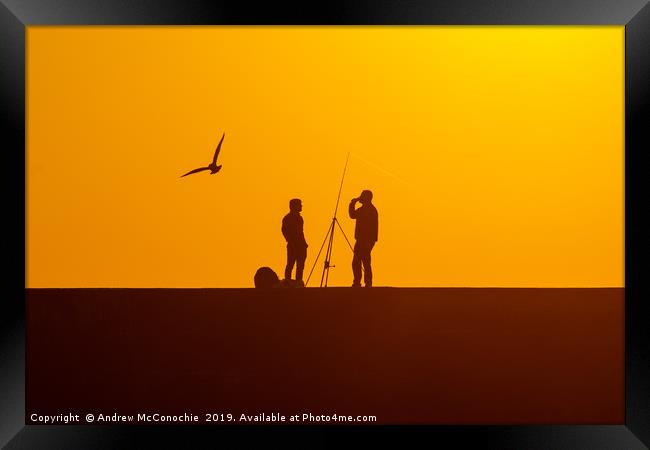Fishing at Sunset Framed Print by Andrew McConochie