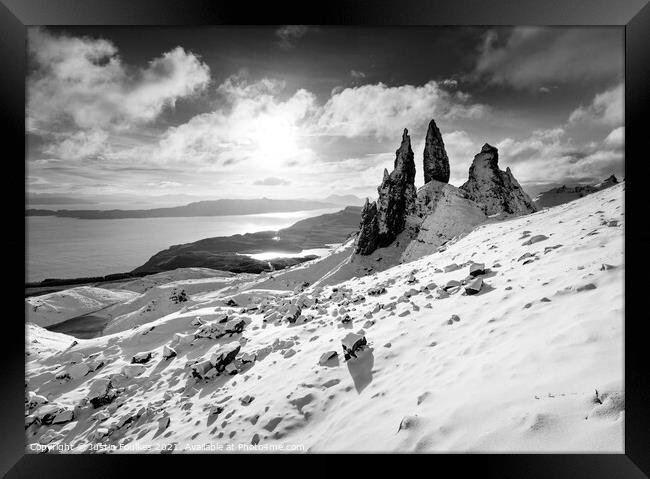 The Old Man of Storr in winter Framed Print by Justin Foulkes