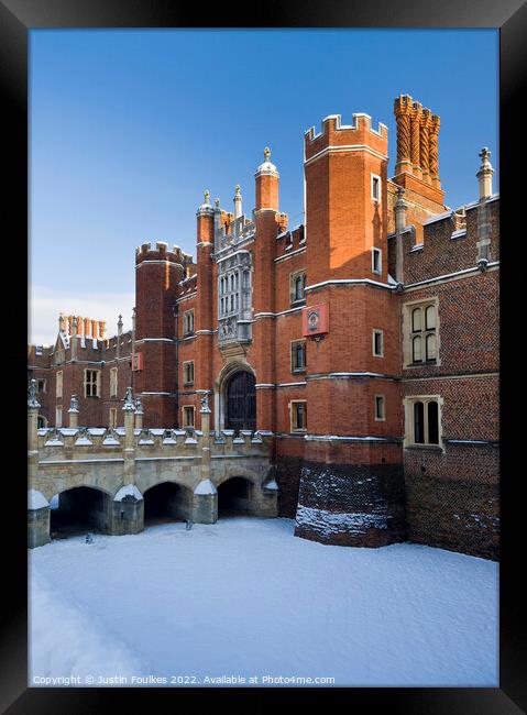Hampton Court Palace in the snow Framed Print by Justin Foulkes