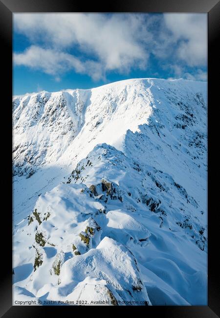Striding Edge, in winter, Helvellyn Framed Print by Justin Foulkes