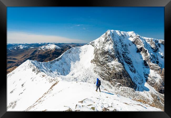 Mountaineer on the Carn Mor Dearg arete, Ben Nevis Framed Print by Justin Foulkes