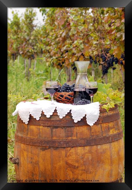 red wine and grape on barrel Framed Print by goce risteski