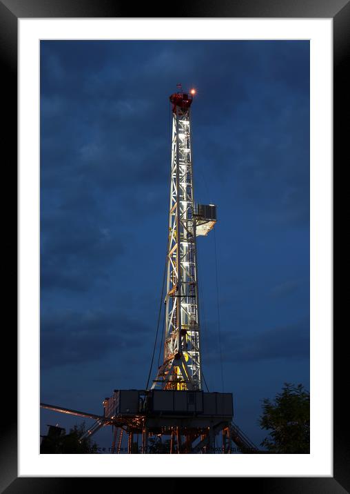 land oil drilling rig illuminated Framed Mounted Print by goce risteski