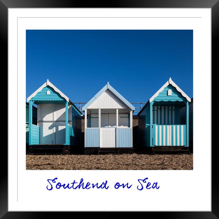 Southend Beach Hut Trio in Blue Framed Mounted Print by Dave Denby