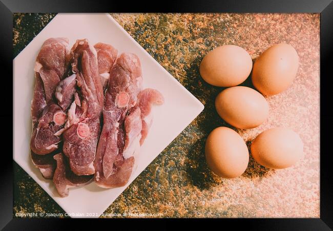 Raw meat and eggs for cooking Framed Print by Joaquin Corbalan