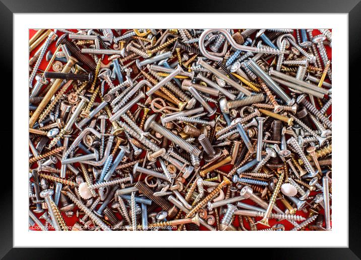 Detail of a pile of screws viewed from above for repairs. Framed Mounted Print by Joaquin Corbalan