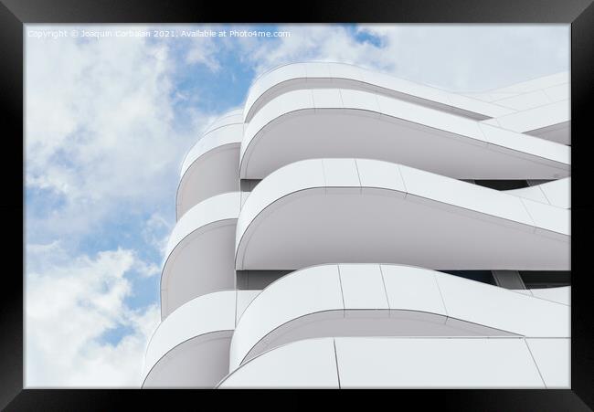 Modern building with terraces of simple lines and monochrome des Framed Print by Joaquin Corbalan