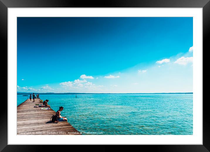 Desenzano del Garda, Italy - September 22, 2021: Tourists enjoy  Framed Mounted Print by Joaquin Corbalan