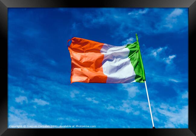 Flag of italy waving against the blue sky with clouds. Framed Print by Joaquin Corbalan