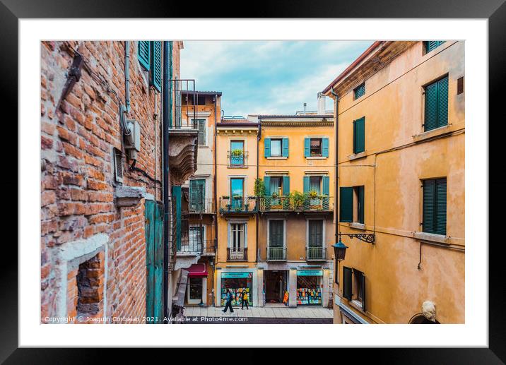 Verona, italy - october 1, 2021: alleys of Verona among which yo Framed Mounted Print by Joaquin Corbalan