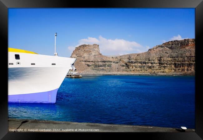 Detail of a ferry moored at Puerto de las Nieves in the Canary I Framed Print by Joaquin Corbalan