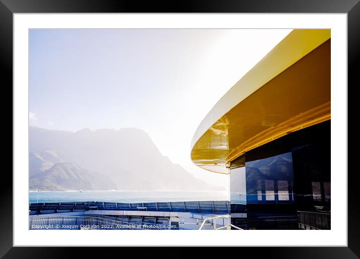 Detail of a ferry moored at Puerto de las Nieves in the Canary I Framed Mounted Print by Joaquin Corbalan