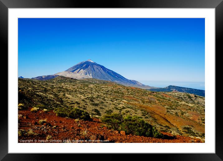impressive view of the Teide volcano with the snowy peak in the  Framed Mounted Print by Joaquin Corbalan