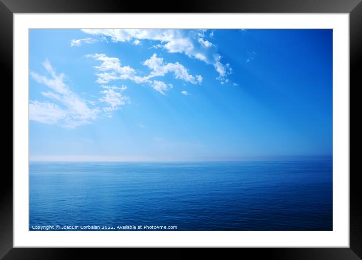 A deep blue in the sea, background with the calm and infinite co Framed Mounted Print by Joaquin Corbalan