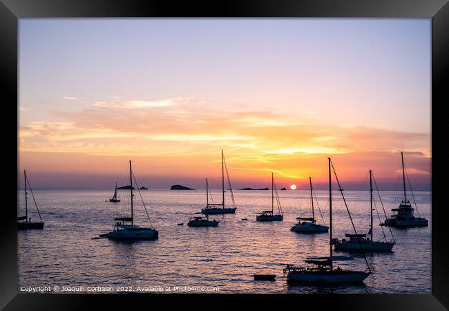 Several yachts and boats anchored near the coast relax watching  Framed Print by Joaquin Corbalan