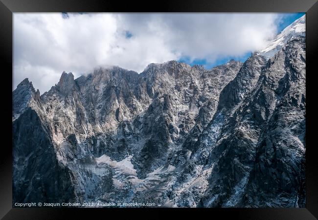 High spectacular rocky spiers on alpine peaks for extreme sports Framed Print by Joaquin Corbalan