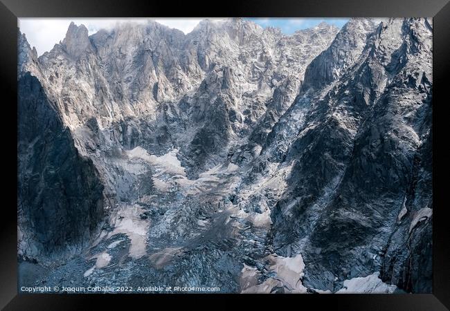 Spectacular mountain crags between glaciers in the alps. Framed Print by Joaquin Corbalan