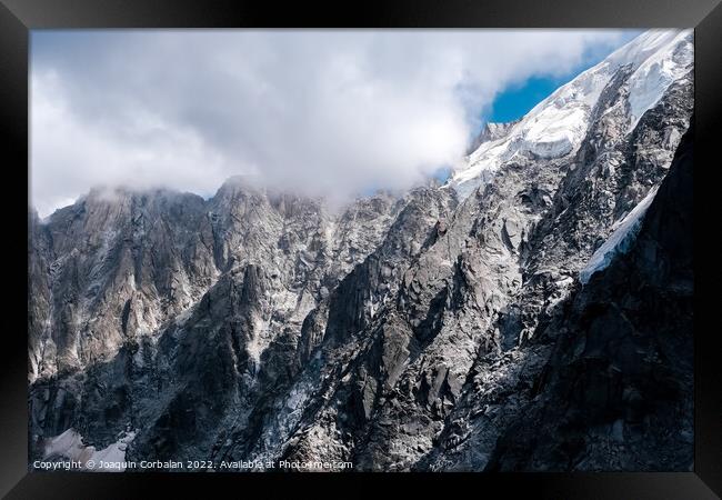 Spectacular mountain crags between glaciers in the alps. Framed Print by Joaquin Corbalan