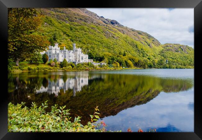 Kylemore Abbey, reflected in the lake, Ireland. Framed Print by Joaquin Corbalan