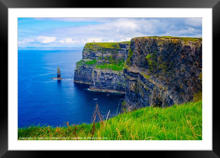 Beautiful view of the Cliffs of Moher, a calm blue sea with copy space. Framed Mounted Print by Joaquin Corbalan