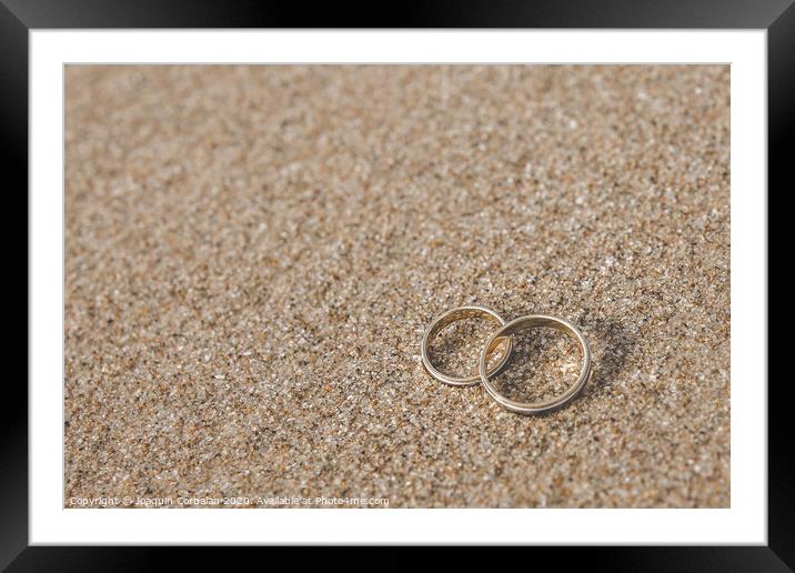 Wedding rings for the bride and groom. Framed Mounted Print by Joaquin Corbalan