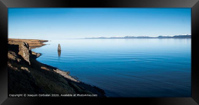 Relaxing landscape to calm down and relieve stress, blue lake with serene and calm waters in the middle of wild nature. Framed Print by Joaquin Corbalan