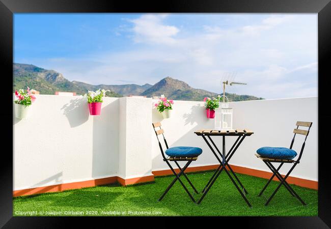 Beautiful white terrace with chairs and coffee table overlooking the Mediterranean mountain, blue sky. Framed Print by Joaquin Corbalan