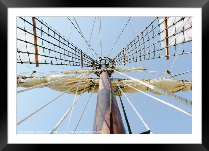 Mainmast and rope ladders to hold the sails of a sailboat. Framed Mounted Print by Joaquin Corbalan